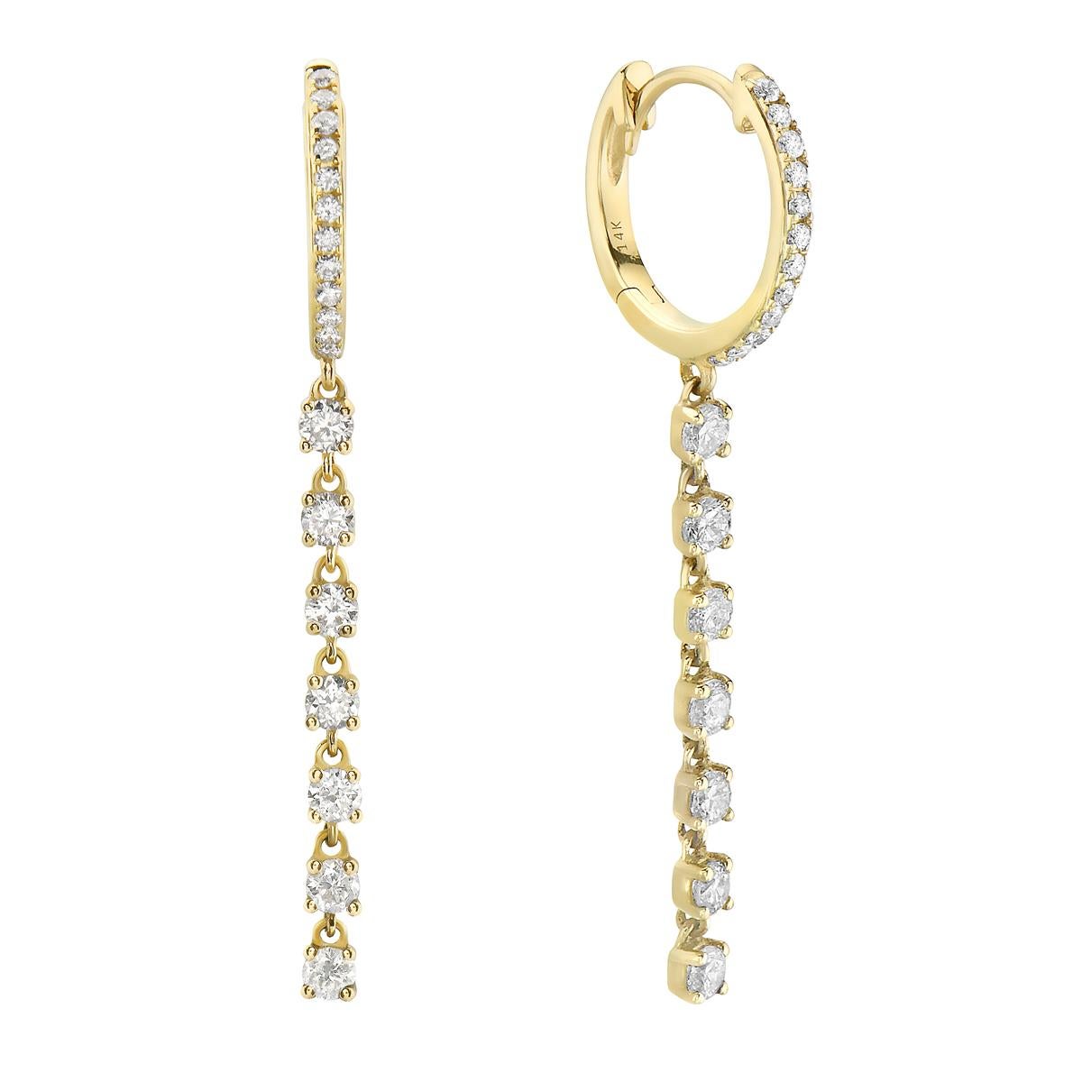 With these exquisite yellow gold dangle earrings, style and glamour are in the spotlight. These earrings are set in 14-carat gold, made out of 3.5 grams of gold. The color of the diamonds is GH. The clarity is SI1-OSI2. It is made out of 38 diamonds