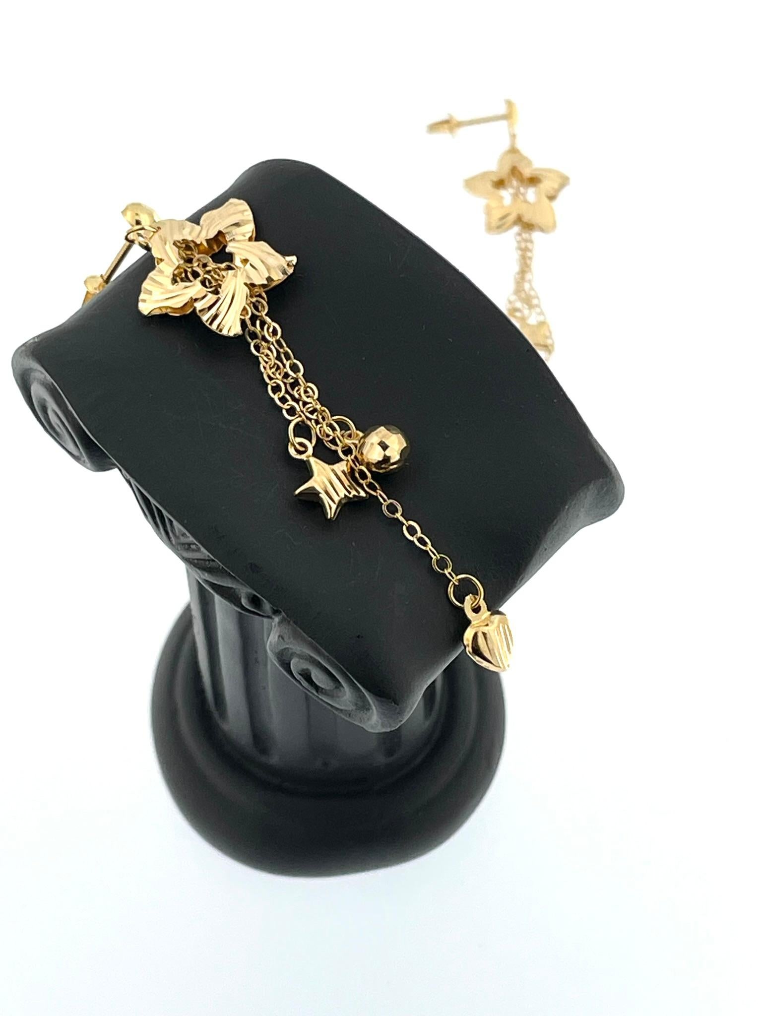 Yellow Gold Dangle Star Shaped Earrings For Sale 1