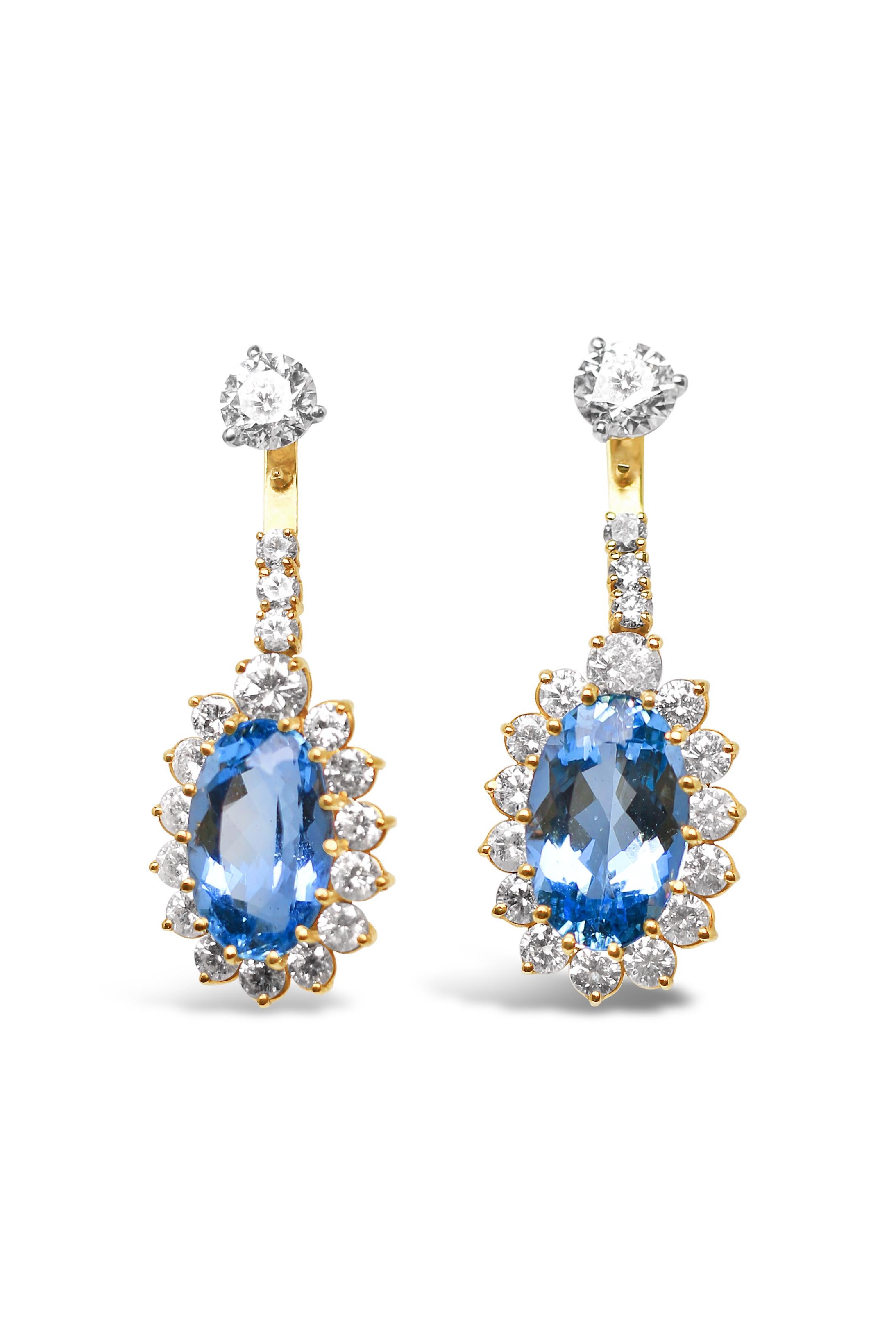 One pair of lady's 14K Yellow Gold Diamond and Aquamarine Earrings containing 2 Round shape diamonds with 1.40 carats total weight. Drops Contain 10 full cut diamonds .81 carat total weight with 2 oval Aquamarine stones 8.8 carats total weight and