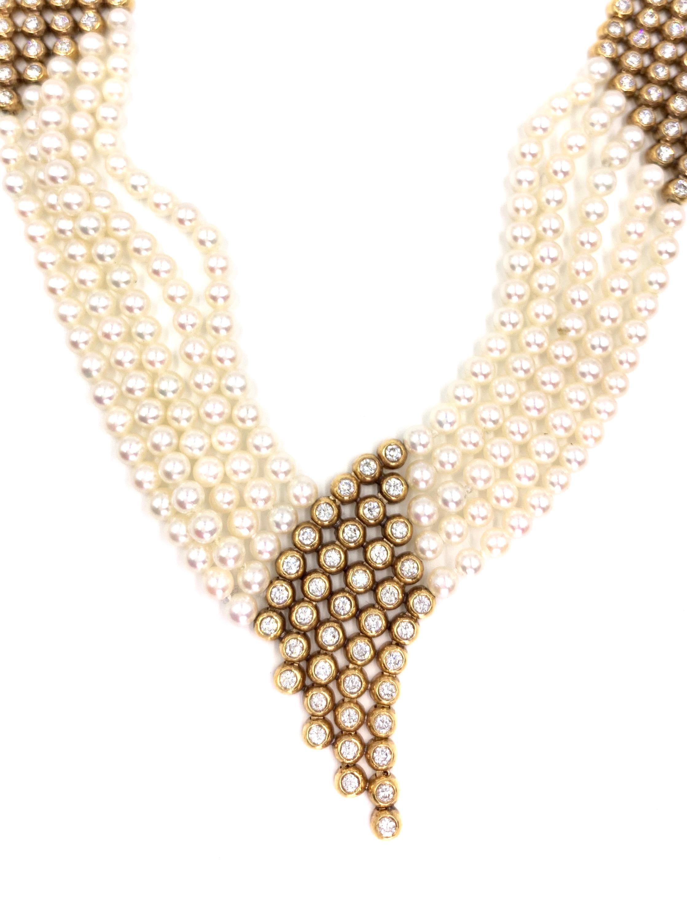 An exquisite necklace with modern appeal yet a not-so-subtle nod to fabulous Gatsby era jewelry. This five strand piece is designed to lay beautifully and comfortably on the neck with a feminine curved V drop in the center. Each strand is composed
