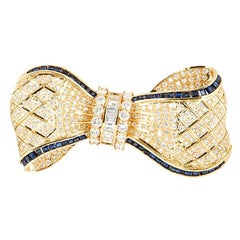 Yellow Gold Diamond and Sapphire Bow Brooch 7.62 carats