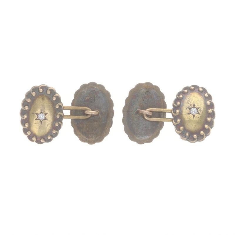 Era: Art Deco
Date: 1920s - 1930s

Metal Content: 14k Yellow Gold

Stone Information

Natural Diamonds
Carat(s): .10ctw
Cut: European
Color: F - G
Clarity: SI1 - SI2

Total Carats: .10ctw

Style: Cufflinks
Theme: Star Scallop,