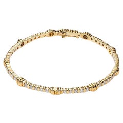 Bracelet jonc en or jaune et diamants