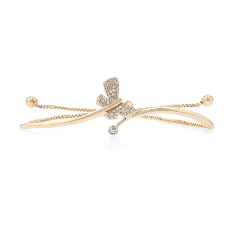 Metal Content: 14k Yellow Gold 

Stone Information: 
Natural Diamonds  
Total Carats: .20ctw
Cut: Single
Color: G - H
Clarity: VS2 - SI1 

Theme: Butterfly, Nature
Bracelet Style: Bypass Bolo 
Chain Style: Wheat 
Closure Type: Slide