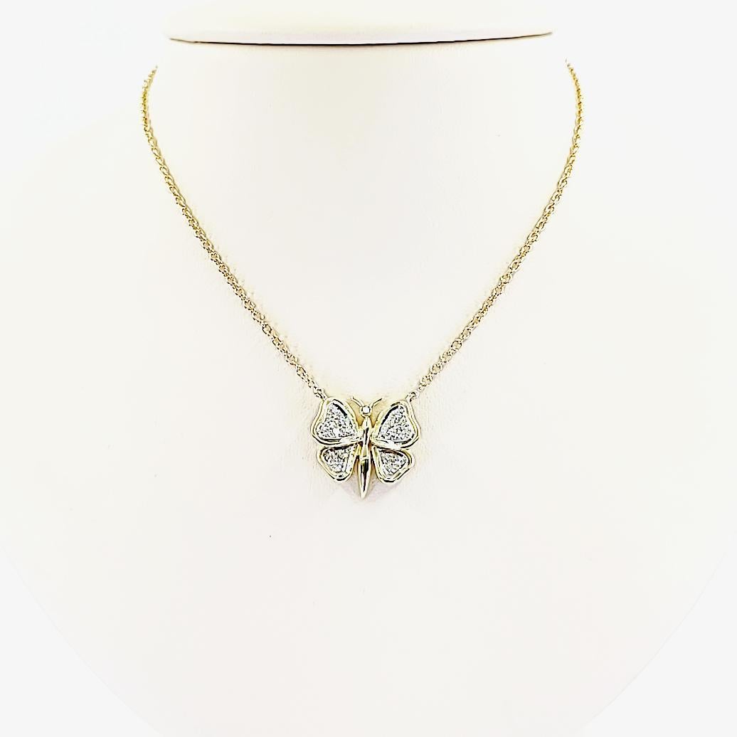 18 Karat Yellow Gold Butterfly Pendant Necklace Featuring 19 Single Cut Round Diamonds of VS Clarity & G/H Color Totaling 0.19 Carats. 16.5 Inches Long. Finished Weight Is 6.5 Grams.