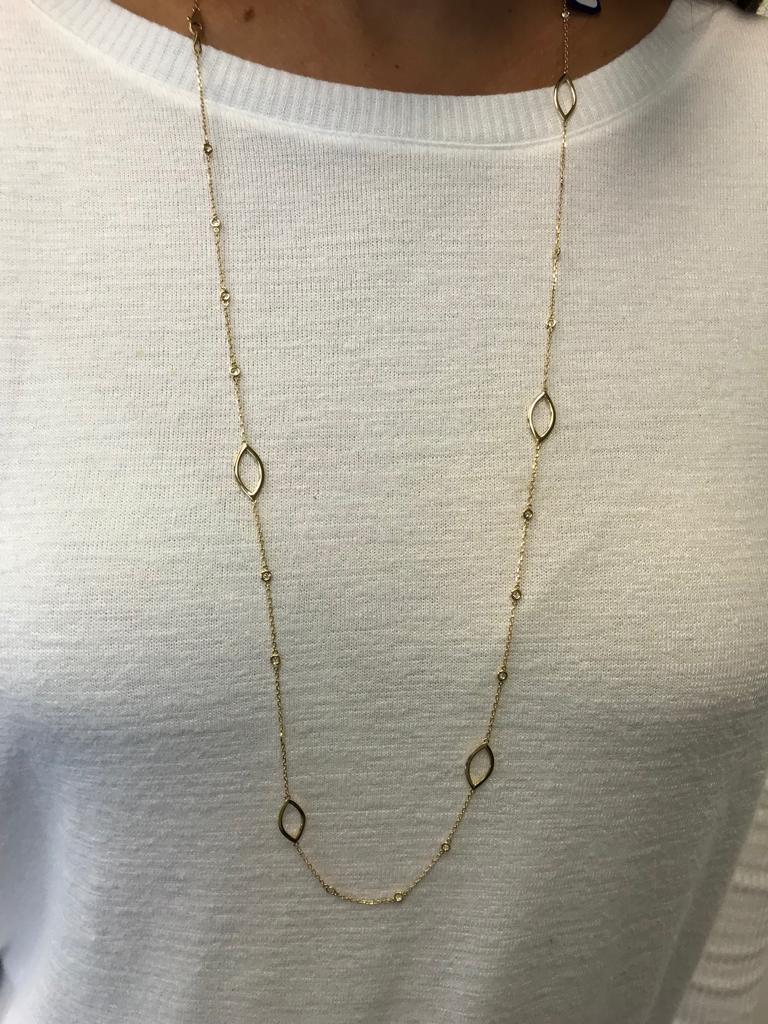 Diamond by the yard necklace set in 14K yellow gold. The total weight is 0.78 carats, each stone weighs approximately 0.03 carats. The length of the necklace is 36 inches. The color and clarity of the stones are G color, SI1-SI2. Available in white