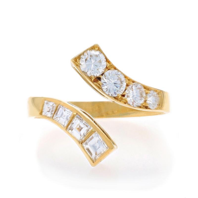 Size: 7

Note: Adjustable

Metal Content: 18k Yellow Gold

Stone Information

Natural Diamonds
Carat(s): .65ctw
Cut: Round Brilliant
Color: G - H
Clarity: VS1 - VS2

Natural Diamonds
Carat(s): .57ctw
Cut: Square Step / Carre
Color: G - H
Clarity: