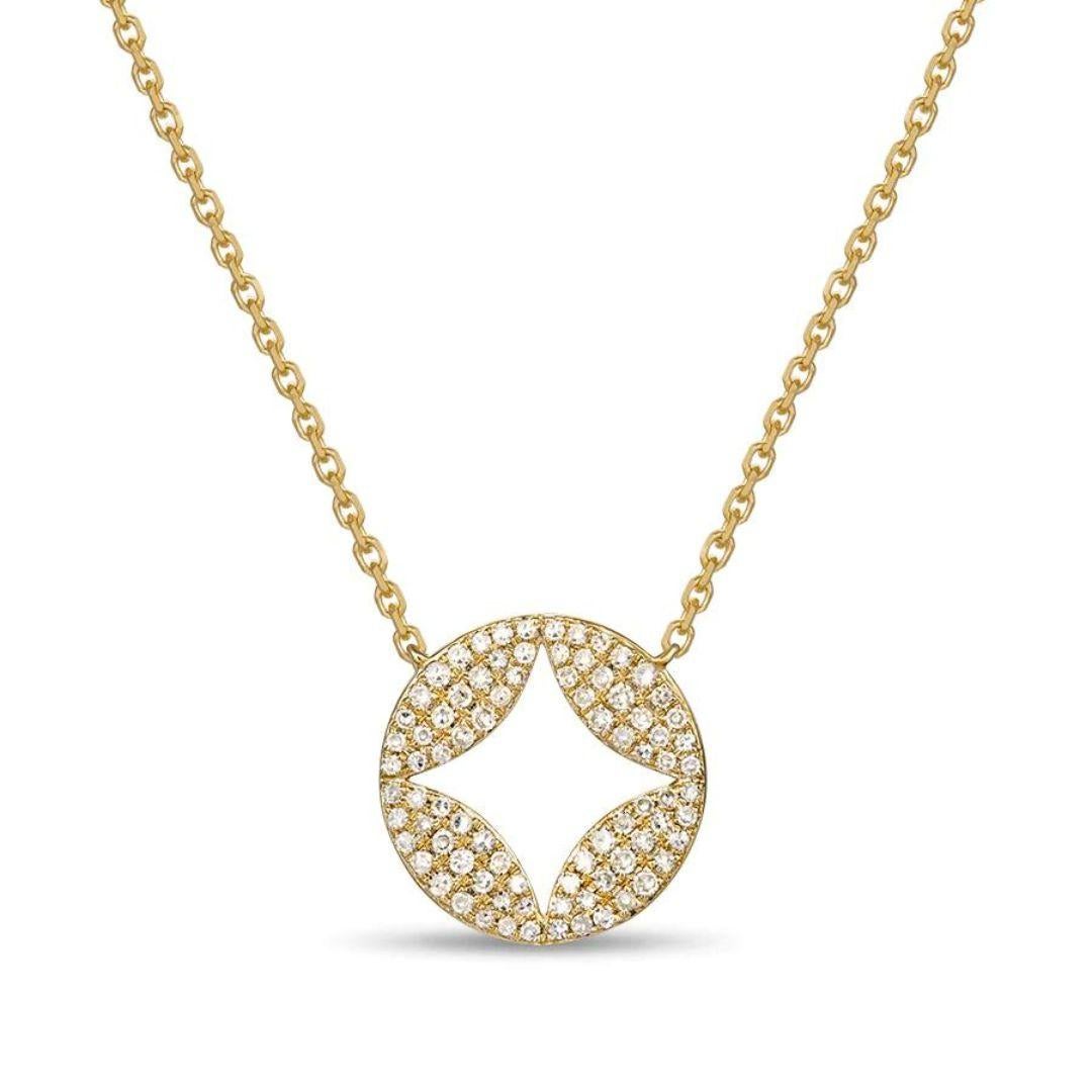 Classic circle pendant in 14k yellow gold with negative space elements. Perfect for casual wear and a night out. Pendant contains eighty four round white diamonds, H-I color, SI clarity, 0.23 ctw. Adjustable length 16-18 inches.