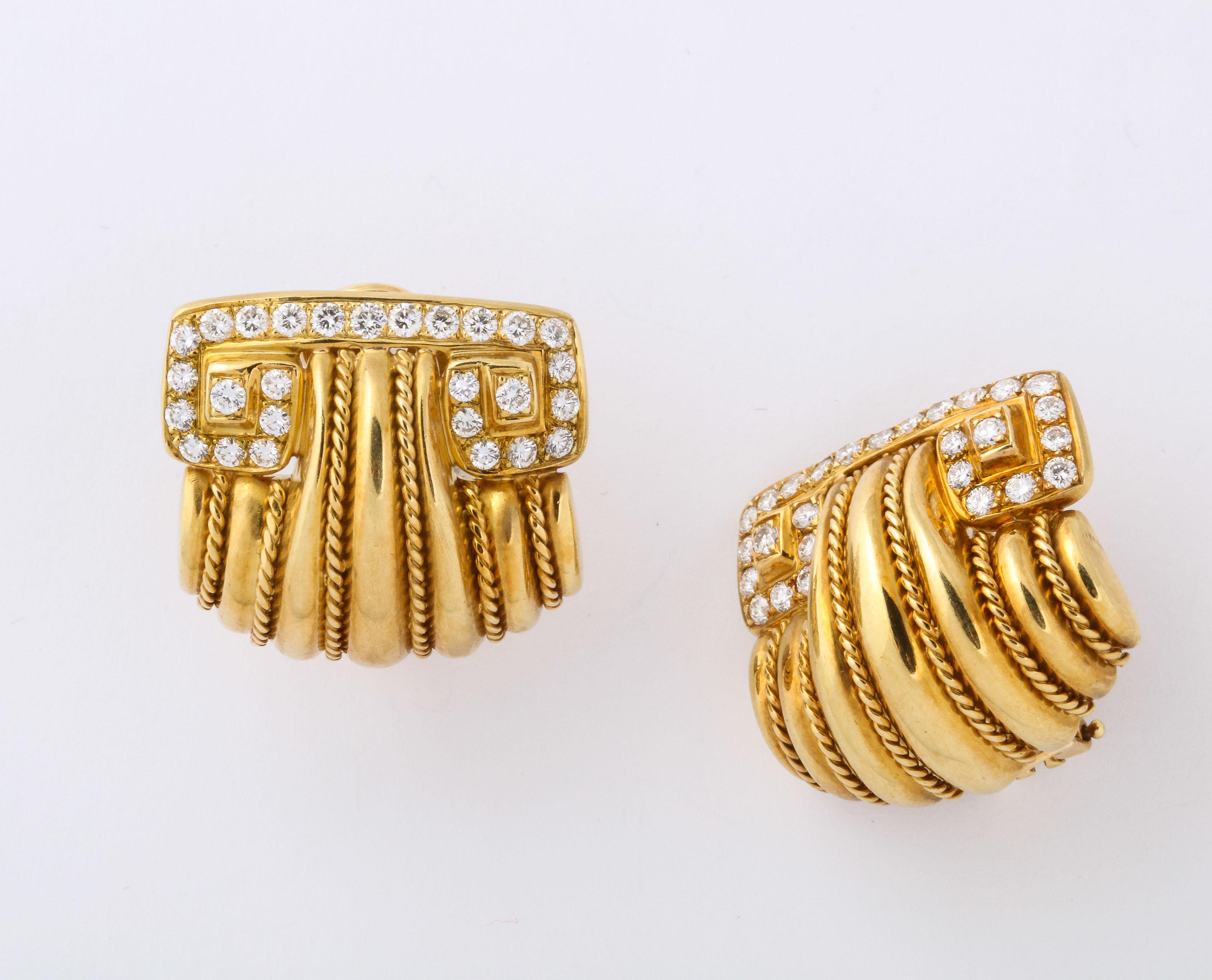18kt Yellow Gold Clip on Earrings with Post. which can be removed.  Signed JBC and marked 18K.  Greecian  Style Capitals with Doric elements paved with full cut clean white Diamonds.  54 Diamonds weighing approximately 1.25cts.  
Applied rope