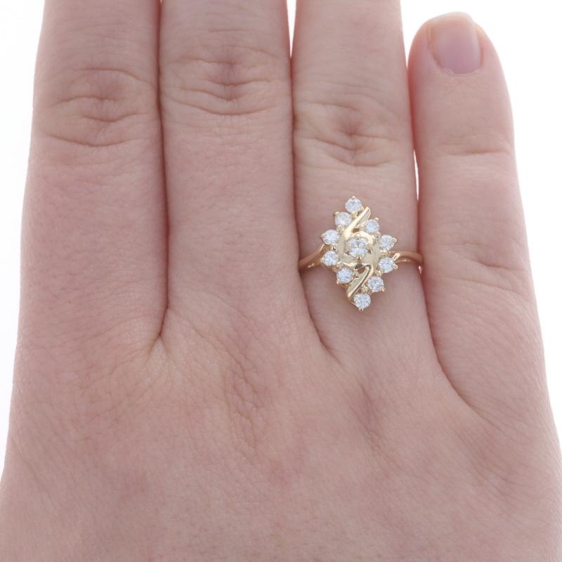 Size: 7
Sizing Fee: Up 2 sizes for $25 or Down 2 sizes for $25

Metal Content: 14k Yellow Gold

Stone Information

Natural Diamonds
Carat(s): .50ctw
Cut: Round Brilliant
Color: F - G
Clarity: SI2 - I1

Total Carats: .50ctw

Style: Cluster Cocktail