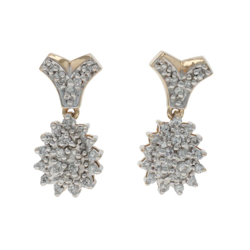 Metal Content: 14k Yellow Gold 
14k White Gold

Stone Information

Natural Diamond
Carat(s): .50ctw
Cut: Round Brilliant
Color: H - I
Clarity: SI2 - I1

Total Carats: .50ctw

Style: Cluster Dangle
Fastening Type: Butterfly