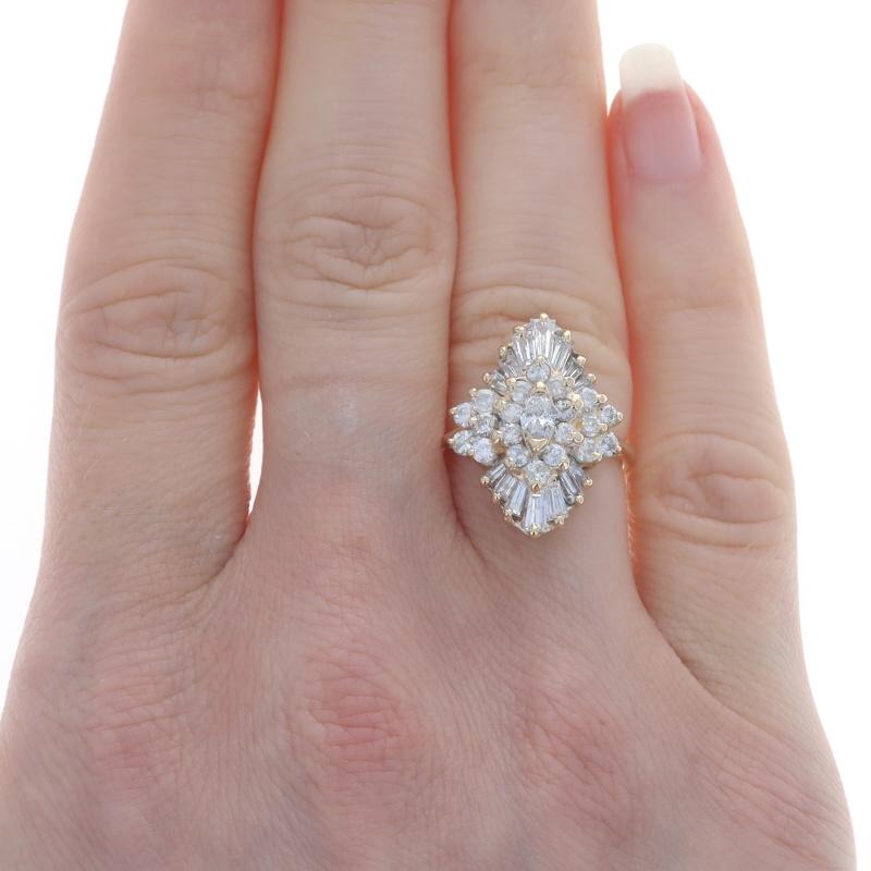 Size: 4 3/4
Sizing Fee: Up 2 1/2 sizes for $35 or Down 1 1/2 sizes for $30

Metal Content: 14k Yellow Gold & 14k White Gold

Stone Information
Natural Diamonds
Carat(s): 2.00ctw
Cut: Marquise, Round Brilliant, & Baguette
Color: G - H
Clarity: SI2 -