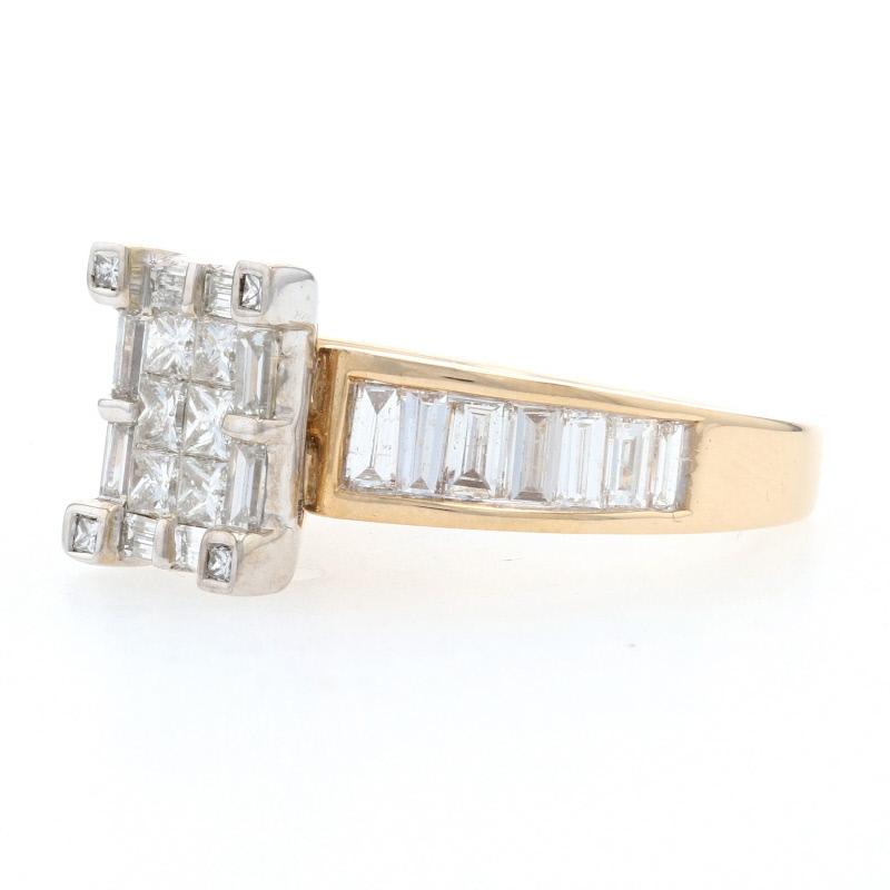 Fashioned in 14k yellow gold, this dramatic engagement piece features a composite of square-cut diamonds set in a raised frame of  gleaming white gold. Shimmering baguettes border the composite and adorn the sides of the band as they taper into a