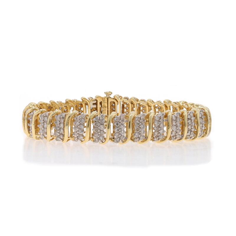 Contenu métallique : Or jaune 10k et or blanc 10k

Informations sur les pierres

Diamants naturels
Carat(s) : 5.00ctw
Coupe : Brillant rond
Couleur : H - I - J
Clarté : I1 - I2

Total des carats : 5.00ctw

Style : Lien en forme de grappe
Type de