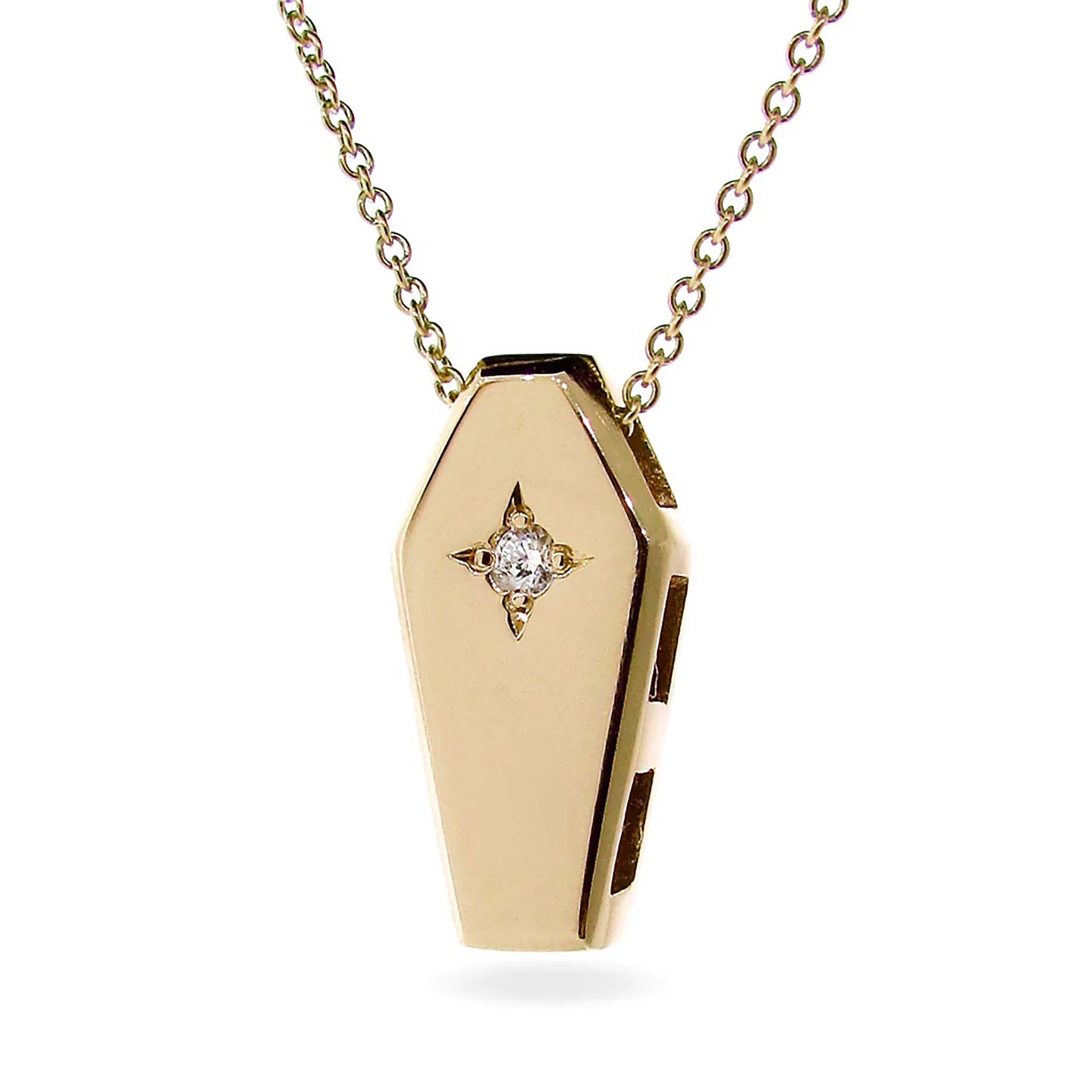 our unique Yellow Gold Diamond Coffin Pendant, is crafted from solid 9k Yellow Gold and a natural White star set Diamond., and hangs from a dainty 45cm 9k yellow gold cable chain, This exquisite piece captures a timeless sentiment of mortality, a