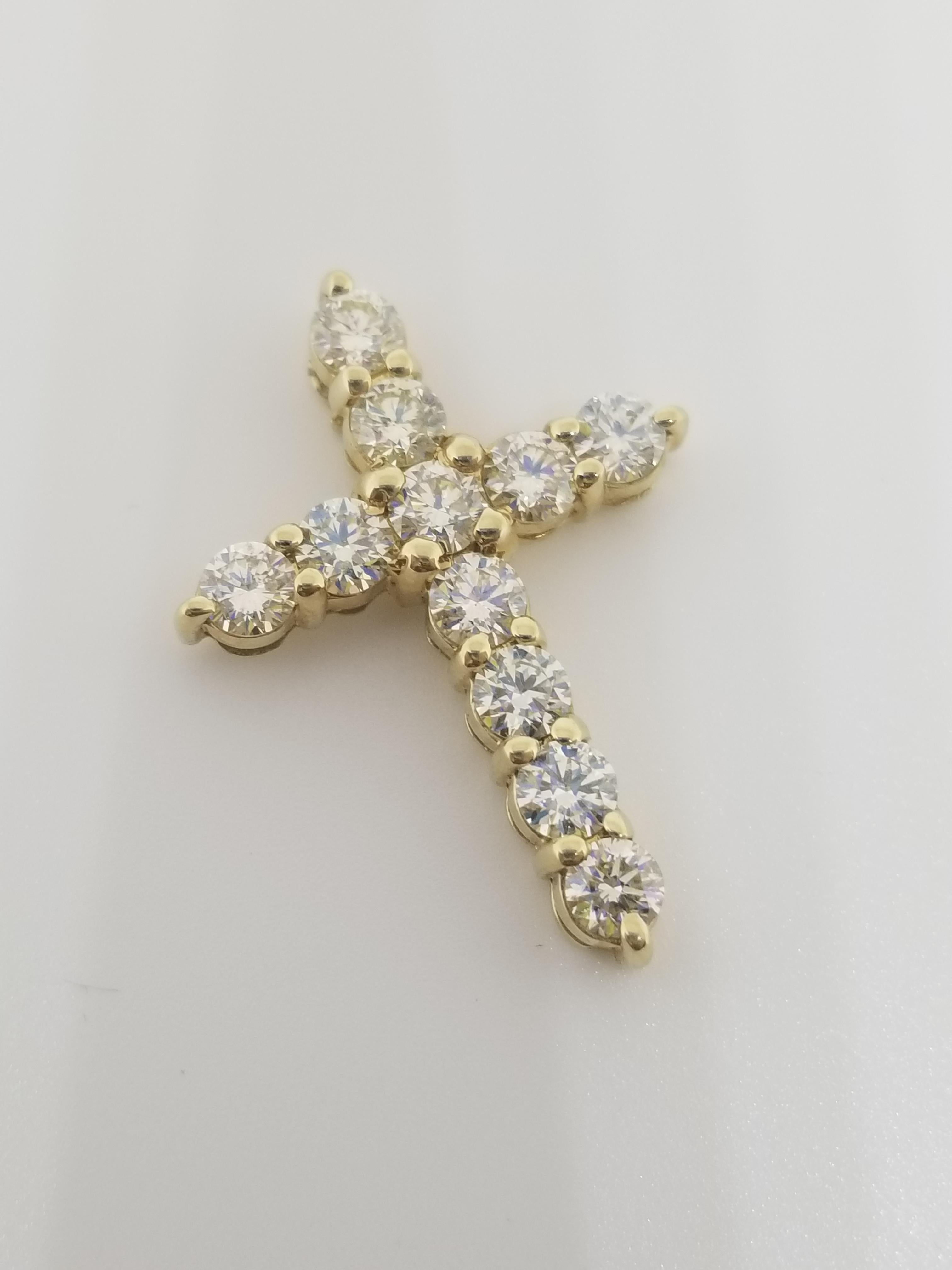 Beautiful 14K Yellow gold and diamond cross pendant. A total weight of 2.22CTS round cut diamonds very sparkly and shiny look.