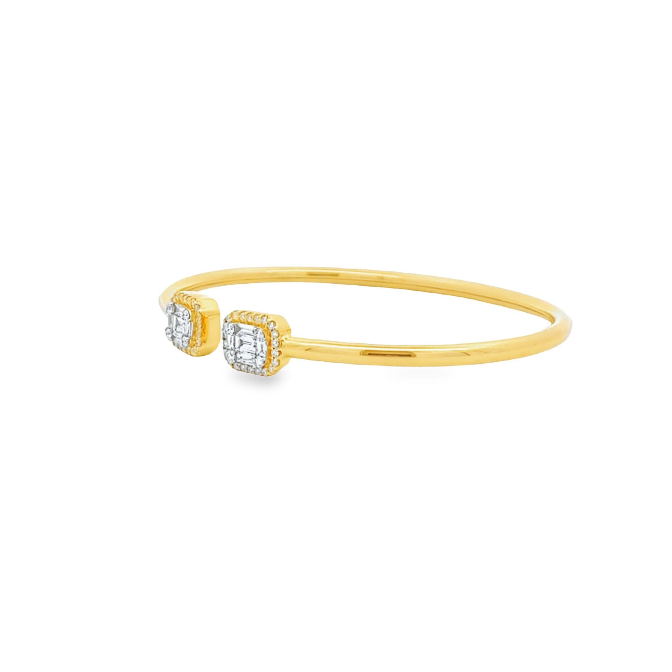 This open bangle is made from 18k yellow gold and features a minimalist design. The ends of the bangle are adorned with two geometric square clusters, each set with 0.42 carats of baguette-cut white diamonds and surrounded by a halo of 0.33 carats