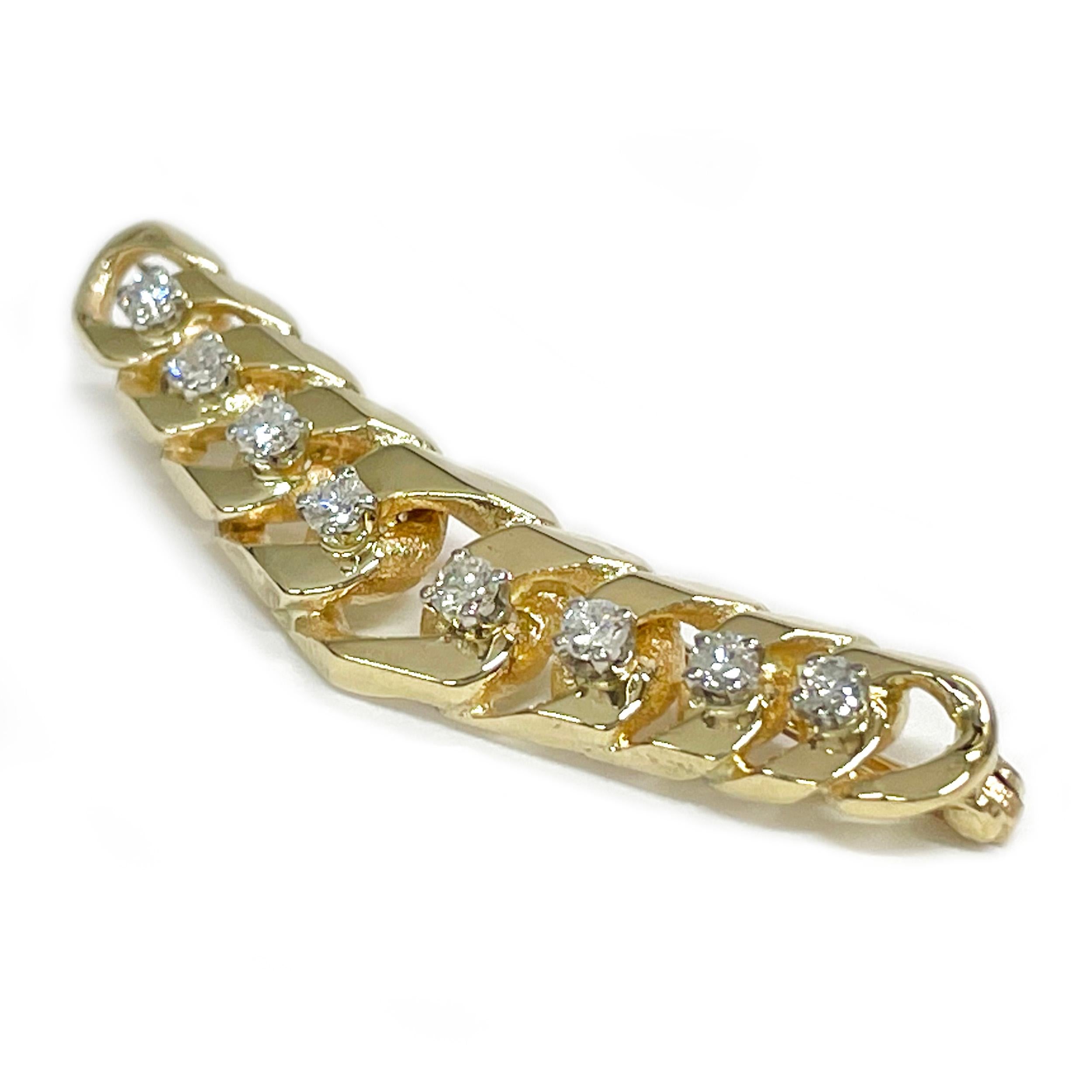 14 Karat Yellow Gold Diamond Curbed Link Diamond Brooch. The unique brooch features graduated curbed link chain base in a chevron shape with prong-set diamonds on top at the point where the links meet horizontally. There are eight SI1 in clarity