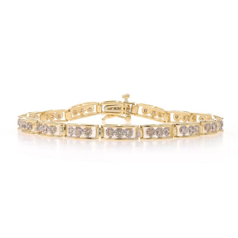 Metal Content: 10k Yellow Gold & 10k White Gold

Stone Information
Natural Diamonds
Carat(s): .80ctw
Cut: Round Brilliant
Color: Champagne Brown
Clarity: SI2 - I1

Total Carats: .80ctw

Style: Curved Link
Fastening Type: Tongue Box Clasp with Side