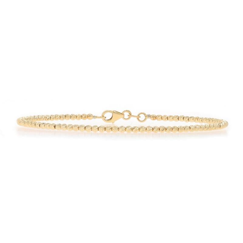 Metallgehalt: 14k Gelbgold

Armband Style: Diamantschliff Perlenarmreif
Verschluss-Typ: Karabinerhakenverschluss

Messungen

Innerer Umfang: 6 3/4