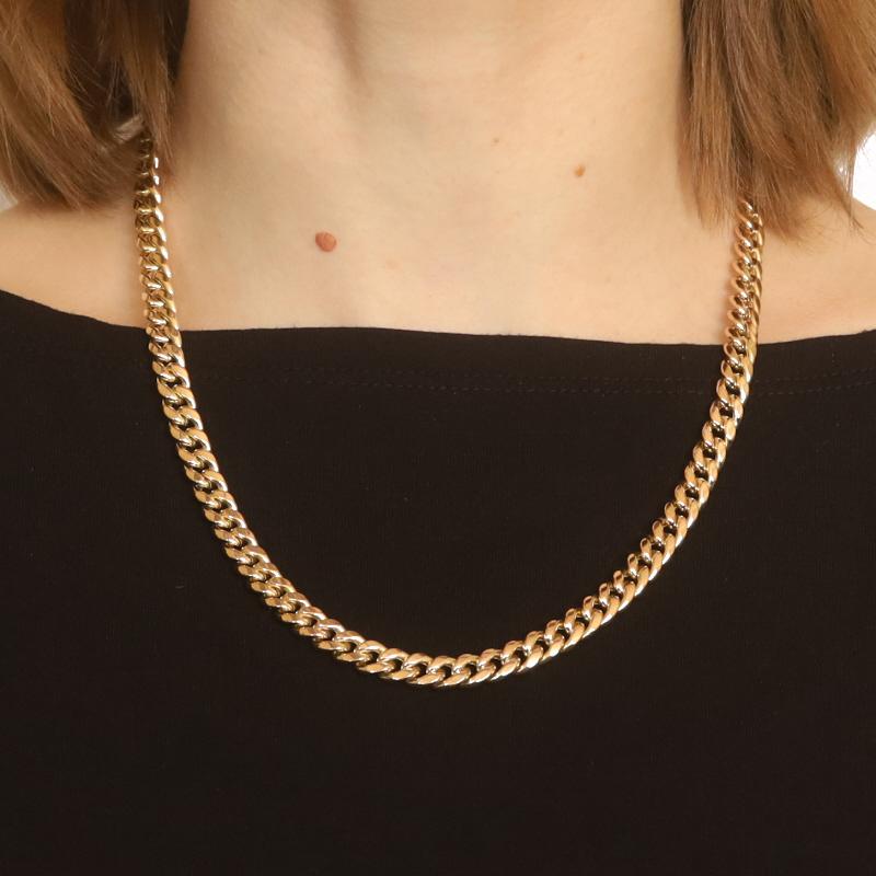 Metal Content: 10k Yellow Gold

Chain Style: Diamond Cut Curb
Necklace Style: Chain
Fastening Type: Tab Box Clasp with Two Side Safety Clasps
Features: Hollow construction for comfortable, all-day wear

Measurements
Length: 20