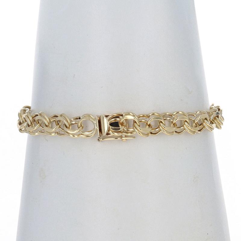 Bracelet à double boucle courbée en or jaune 14 carats avec diamants taille 7 1/2