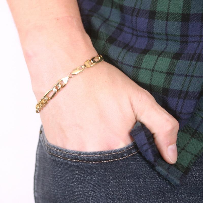 Metal Content: 10k Yellow Gold

Style: Chain 
Bracelet Chain Style: Diamond Cut Figaro
Fastening Type: Lobster Claw Clasp

Measurements
Length: 8