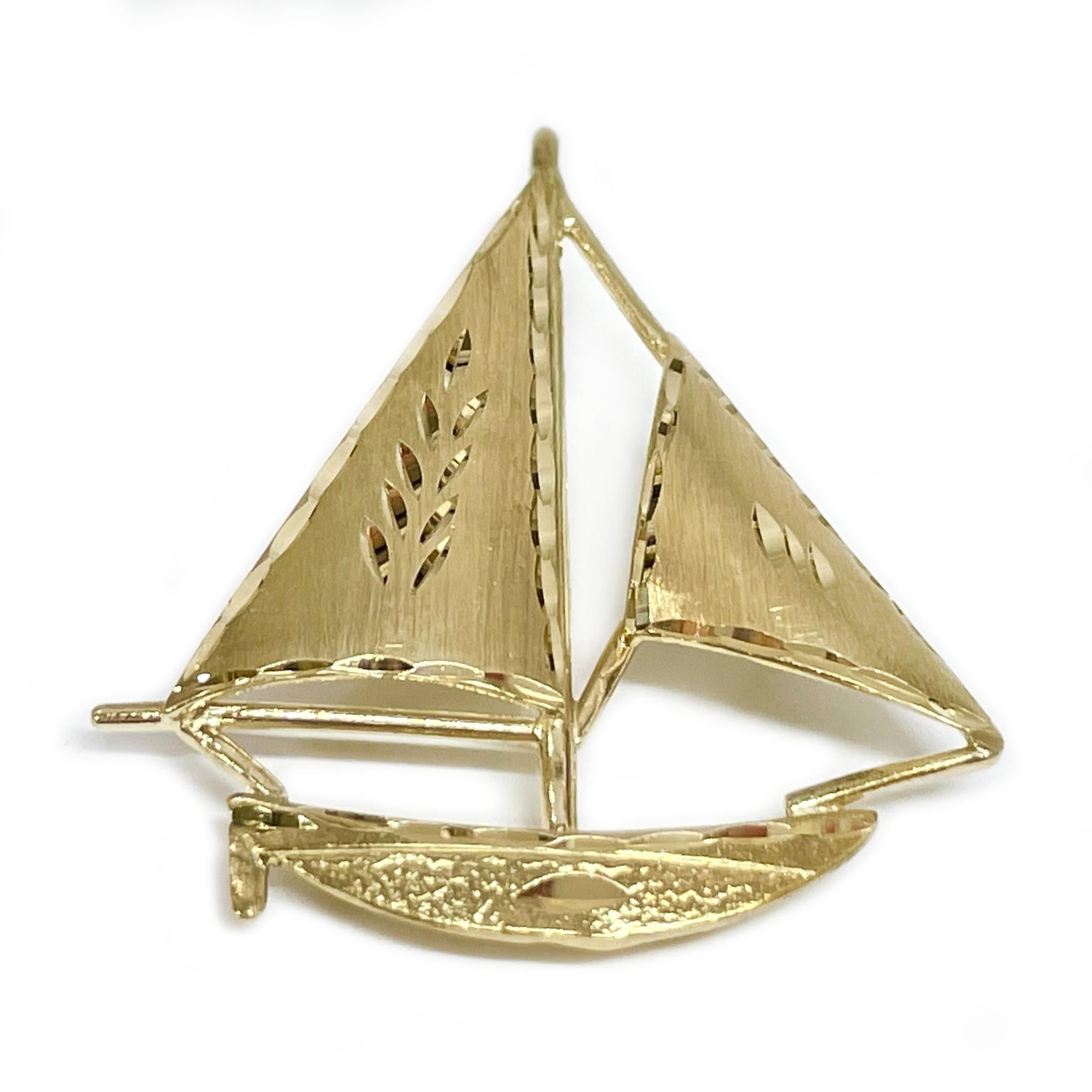 gold sailboat pendant