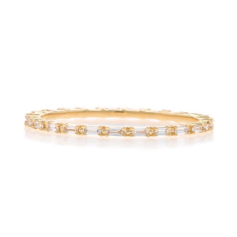 Size: 10

Metal Content: 14k Yellow Gold

Stone Information

Natural Diamonds
Carat(s): .50ctw
Cut: Baguette
Color: G - H
Clarity: VS1 - VS2

Total Carats: .50ctw

Style: Eternity Wedding Band with Diamonds

Measurements

Face Height (north to