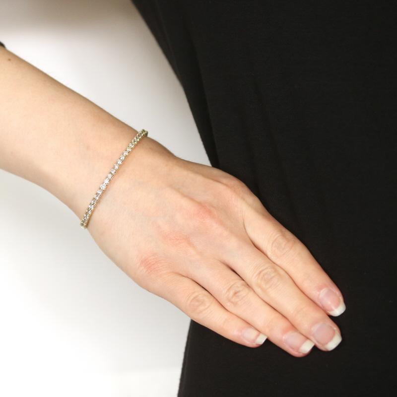 Metallgehalt: 14k Gelbgold

Informationen zu Stein
Natürliche Diamanten
Karat(e): 2.93ctw
Schliff: Runder Brillant
Farbe: J - K
Reinheit: SI1 - SI2

Karat gesamt: 2.93ctw

Stil: Flex-Armreif
Verschluss-Typ: Schnappverschluss

Messungen
Innerer