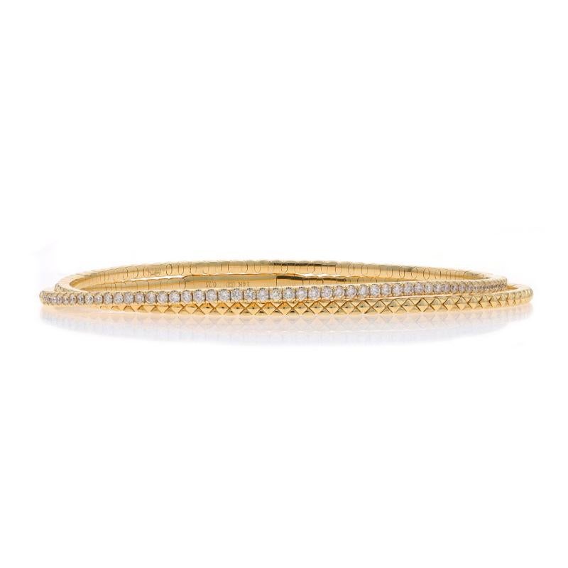 Metal Content: 14k Yellow Gold

Stone Information

Natural Diamonds
Carat(s): .75ctw
Cut: Round Brilliant
Color: H - I
Clarity: SI

Total Carats: 0.75ctw

Style: Flex Wrap Bangle
Fastening Type: Locking Snap Clasp

Measurements

Inner Circumference: