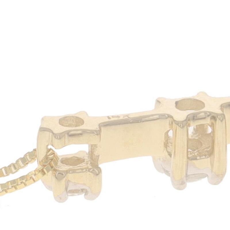 Collana Journey con tre pietre graduate in oro giallo da 18