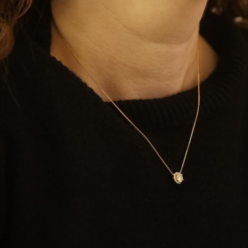 Collana con diamanti a raggiera in oro giallo da 18