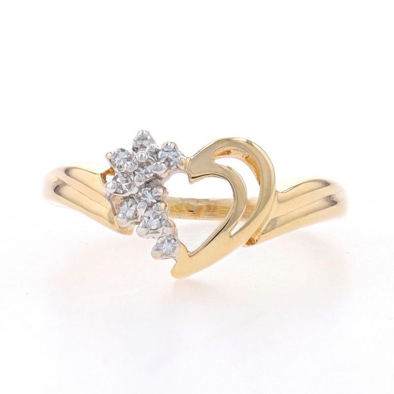Size: 7
Sizing Fee: Up 2 sizes for $35 or Down 3 sizes for $30

Metal Content: 14k Yellow Gold & 14k White Gold

Stone Information

Natural Diamonds
Carat(s): .08ctw
Cut: Single
Color: G - H
Clarity: VS2 - SI1

Style: Cluster
Theme: Heart,