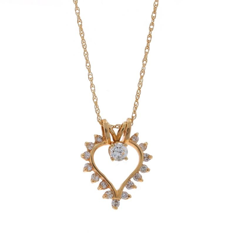 Contenu du métal : Or jaune 14k

Informations sur les pierres
Diamants naturels
Carat(s) : .47ctw
Coupe : Brillant rond
Couleur : I - J - K.
Clarté : SI1 - I1
Note sur la pierre : (seul, le solitaire est de .20ct)

Total des carats : .47ctw

Style
