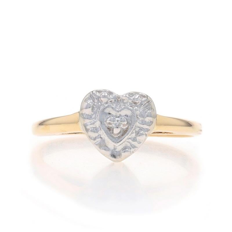 Size: 6
Sizing Fee: Up 3 sizes for $35 or Down 1 1/2 sizes for $35

Metal Content: 10k Yellow Gold & 10k White Gold

Stone Information

Natural Diamond
Cut: Single
Stone Note: (One small accent)

Style: Solitaire
Theme: Heart,