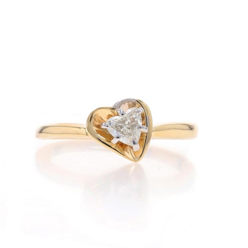 Size: 6
Sizing Fee: Up 3 sizes for $40 or Down 3 sizes for $30

Metal Content: 14k Yellow Gold & 14k White Gold

Stone Information

Natural Diamond
Carat(s): .30ct
Cut: Heart
Color: I
Clarity: SI2

Total Carats: 0.3ct

Style: Solitaire
Theme: Heart,