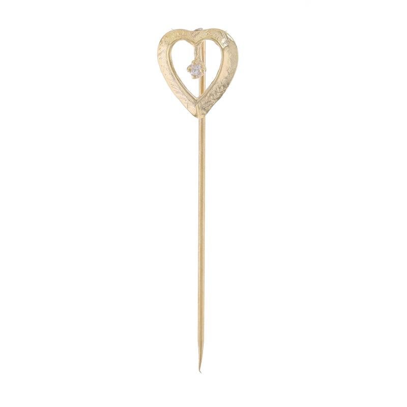 Metal Content: 14k Yellow Gold

Stone Information

Natural Diamond
Cut: Single
Stone Note: (one small accent)

Theme: Heart, Love
Features: Crosshatch Detailing

Measurements

Face Height (north to south): 1/2