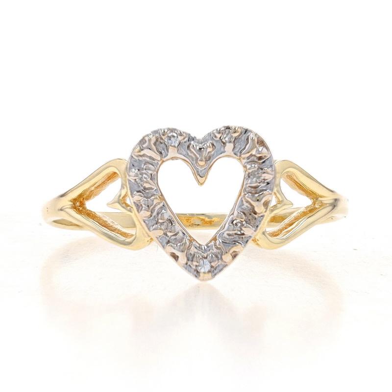 Size: 6 1/2
Sizing Fee: Up 3 sizes for $25 or Down 2 sizes for $20

Metal Content: 10k Yellow Gold & 10k White Gold

Stone Information
Natural Diamonds
Cut: Single

Theme: Heart Trio, Love Wreath
Features: Open Cut Detailing

Measurements
Face