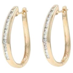 Boucles d'oreilles en or jaune avec diamants - 14k Rd & Baguette .50ctw Channel Set Pierced