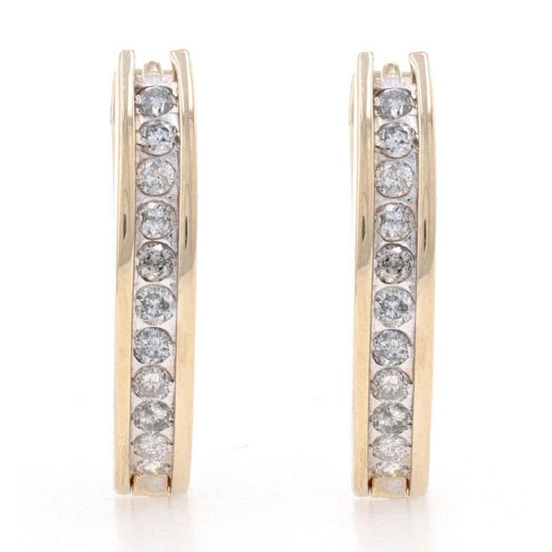Metal Content: 14k Yellow Gold & 14k White Gold

Stone Information
Natural Diamonds
Total Carat Weight: .66ctw
Cut: Round Brilliant
Color: J - K
Clarity: I1 - I2

Style: Hoop 
Fastening Type: Snap Closures

Measurements
Tall: 27/32