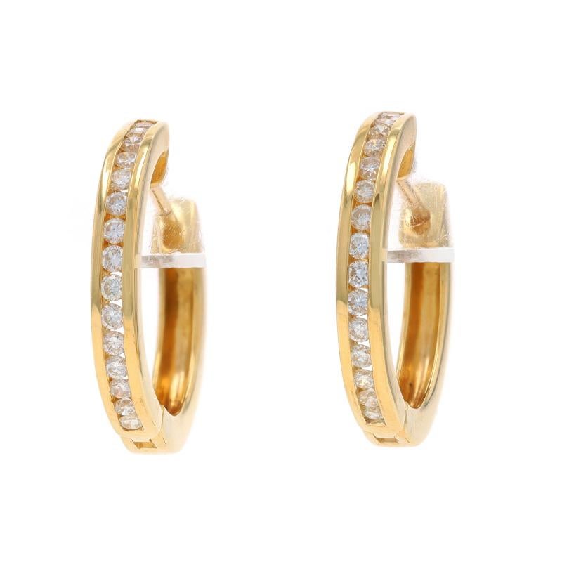 Metal Content: 18k Yellow Gold

Stone Information

Natural Diamonds
Carat(s): .60ctw
Cut: Round Brilliant
Color: G - H
Clarity: VS2 - SI1

Total Carats: .60ctw

Style: Hoop
Fastening Type: Snap Closures
Features: Channel Set

Measurements

Tall:
