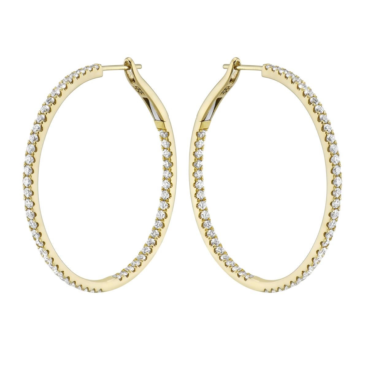 These classic hoops never go out of style and can be worn all the time! These hoops are even more special because the diamonds are on the outside and the inside so you get beautiful sparkle from every angle. There are 104 round SI1-OS12, GH color