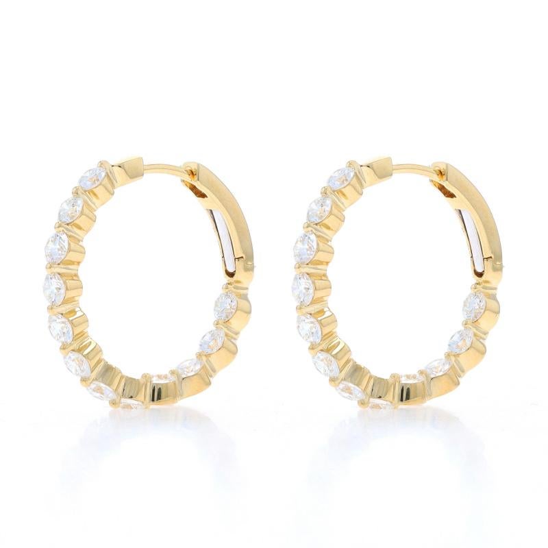 Metal Content: 18k Yellow Gold

Stone Information

Natural Diamonds
Carat(s): 2.11ctw
Cut: Round Brilliant
Color: G - H
Clarity: VS1 - VS2

Total Carats: 2.11ctw

Style: Inside-Out Hoop
Fastening Type: Leverback Closures

Measurements

Tall: 27/32