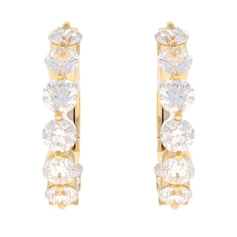 Metal Content: 18k Yellow Gold

Stone Information

Natural Diamonds
Carat(s): 3.05ctw
Cut: Round Brilliant
Color: G
Clarity: VS2 - SI1

Total Carats: 3.05ctw

Style: Inside-Out Hoop
Fastening Type: Leverback Closures

Measurements

Tall: 25/32