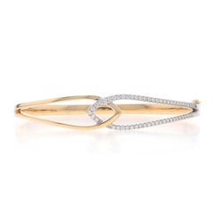 Armreif aus Gelbgold mit ineinander verschlungenen Blättern und Diamanten 6 3/4" - 14k rund .50ctw