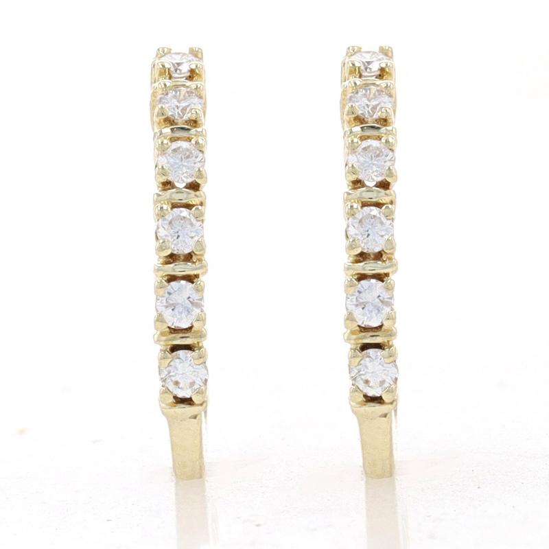 Metal Content: 14k Yellow Gold

Stone Information

Natural Diamonds
Carat(s): .18ctw
Cut: Round Brilliant & Single
Color: F - G
Clarity: SI1 - SI2

Total Carats: .18ctw

Style: J-Hook
Fastening Type: Butterfly Closures

Measurements

Tall: 9/16