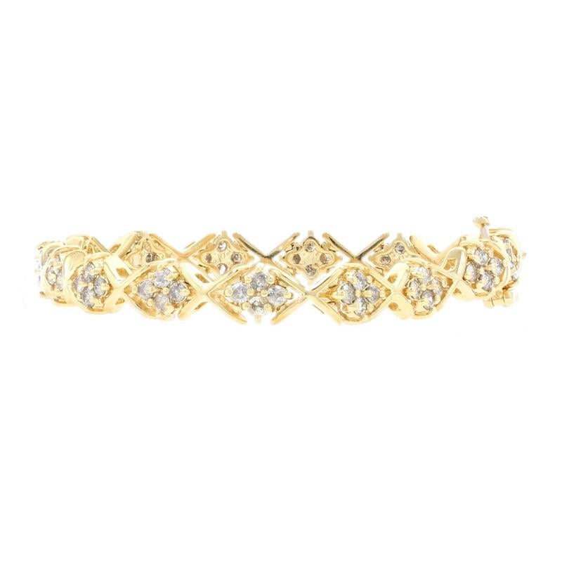 Timelessly beautiful, this piece will be a wonderful addition to your fine jewelry collection! This 14k yellow gold bracelet showcases X-shaped links set between links adorned with clusters of natural diamonds for the perfect balance of sparkle and