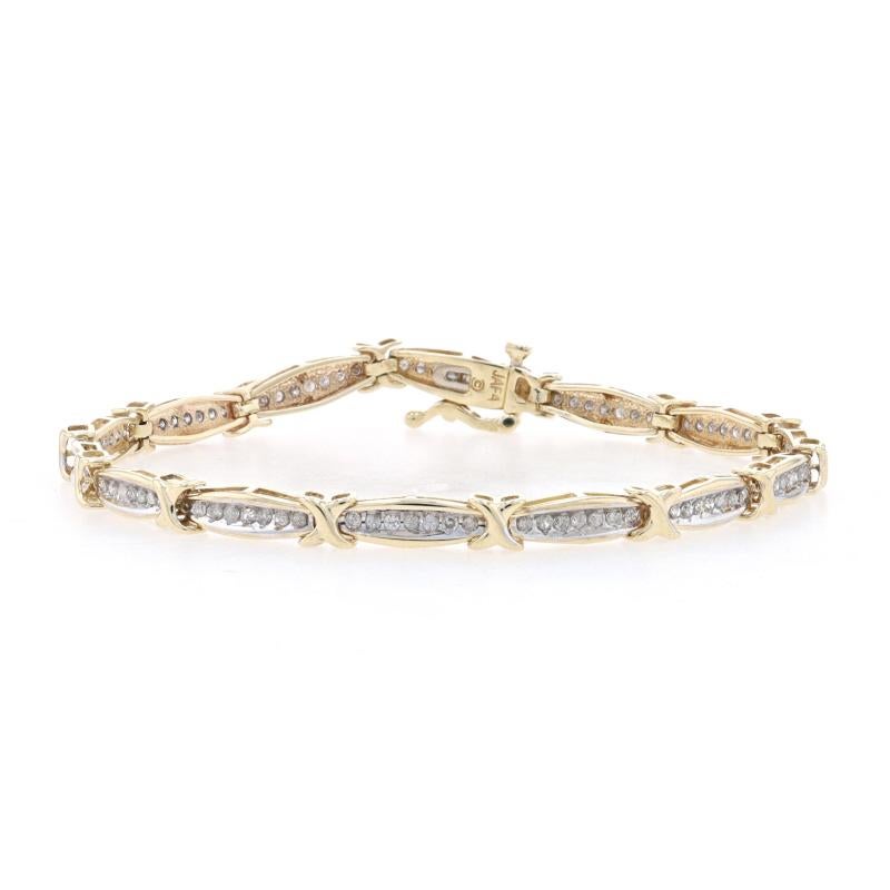 Contenu métallique : Or jaune 10k et or blanc 10k

Informations sur les pierres
Diamants naturels
Carat(s) : 1.40ctw
Coupe : Simple
Couleur : F-G
Clarté : I1-I2

Total des carats : 1.40ctw

Style : Lien 
Type de fermeture : Fermoir à languette avec