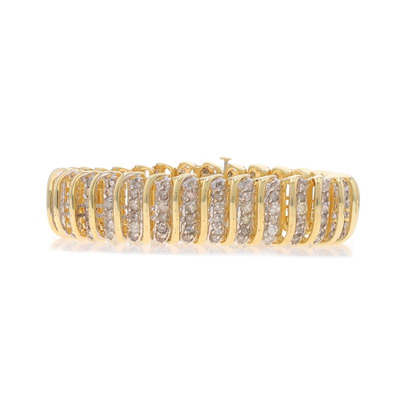 Contenu métallique : Or jaune 14k et or blanc 14k

Informations sur les pierres

Diamants naturels
Carat(s) : 10.00ctw
Coupe : Brillant rond
Couleur : H - I - J
Clarté : I1 - I2

Total des carats : 10.00ctw

Style : Lien
Type de fixation : Deux